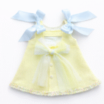 EvaBella A-Line Open Back Dress – Pastel Yellow – Blue Satin Shoulder Bows-– Soft Textured Tweed-Effect Knit – Tweed Trim Detail-EBSS06 Pastel Yellow - Image 2