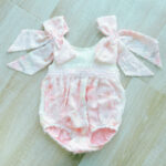 EvaBella Pastel Floral Open Back Romper – Baby Pink – Oversized Shoulder Bows – Tutu Chest Detail with Shimmer Tweed Trim-EBSS02 - Image 3