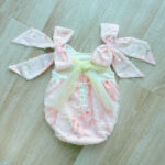 EvaBella Pastel Floral Open Back Romper – Baby Pink – Oversized Shoulder Bows – Tutu Chest Detail with Shimmer Tweed Trim-EBSS02 - Image 4