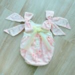 EvaBella Pastel Floral Open Back Romper – Baby Pink – Oversized Shoulder Bows – Tutu Chest Detail with Shimmer Tweed Trim-EBSS02 - Image 4
