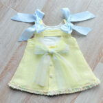 EvaBella A-Line Open Back Dress – Pastel Yellow – Blue Satin Shoulder Bows-– Soft Textured Tweed-Effect Knit – Tweed Trim Detail-EBSS06 Pastel Yellow - Image 4